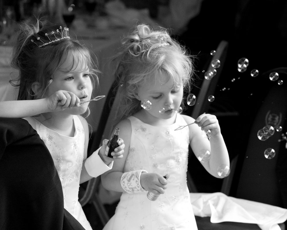 ridesmaids blowing bubbles at a Sheffield wedding